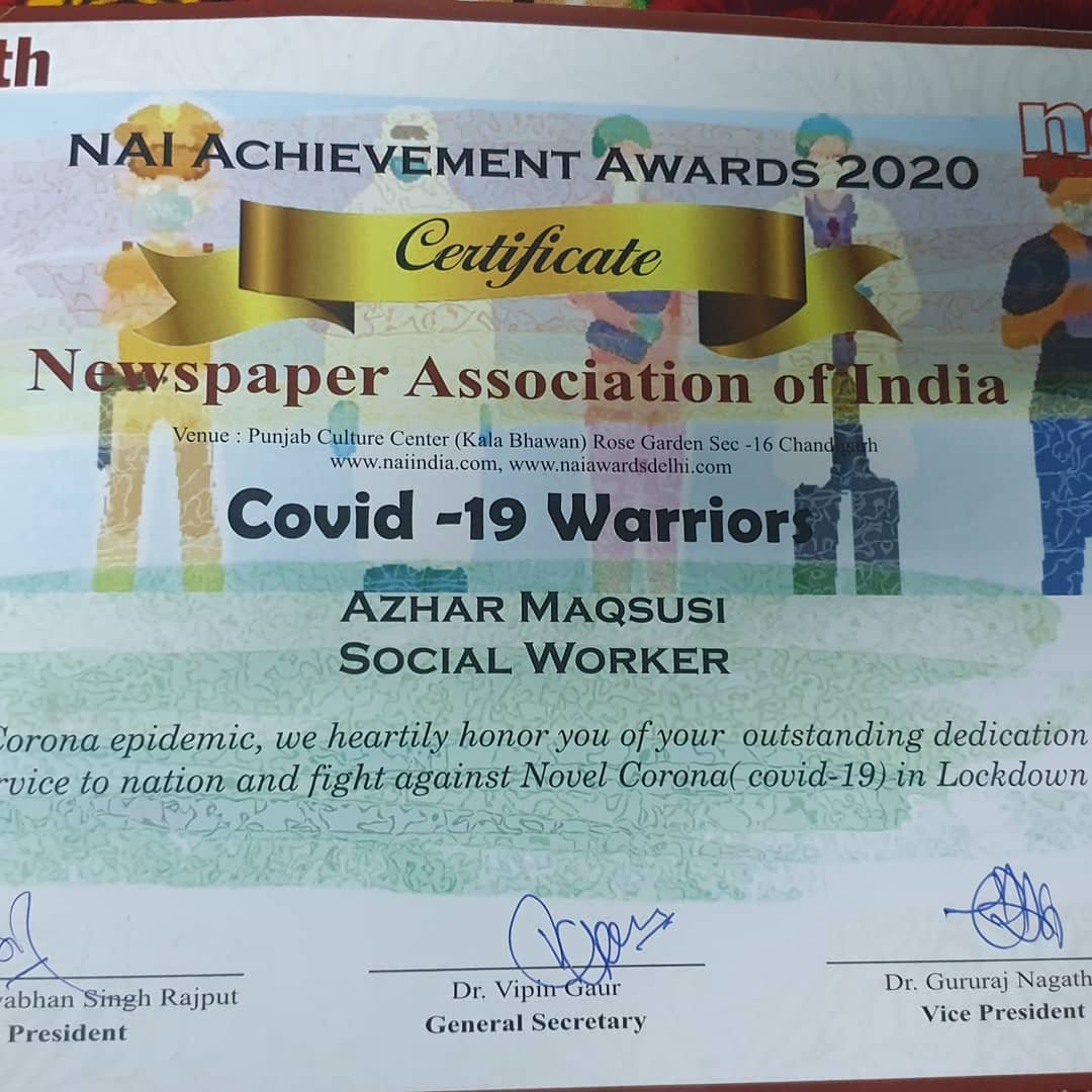 Azhar Maqsusi receiving the 2020 COVID-19 Warrior Award